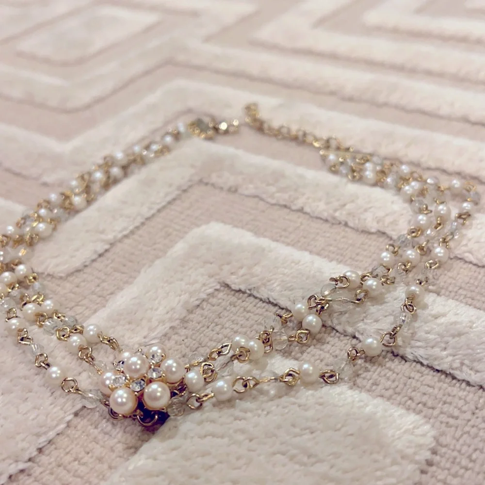 Delicate multi chain gold and pearl choker necklace